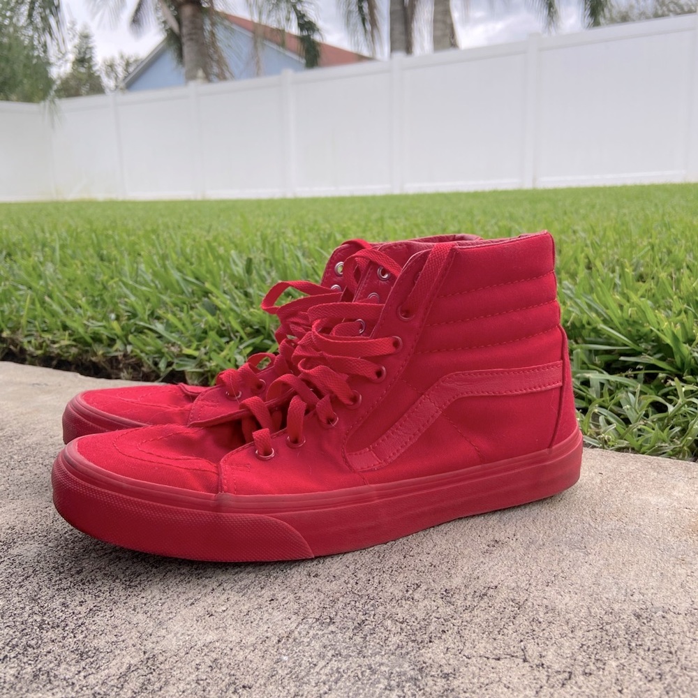 All red Vans Off The Wall hi tops
